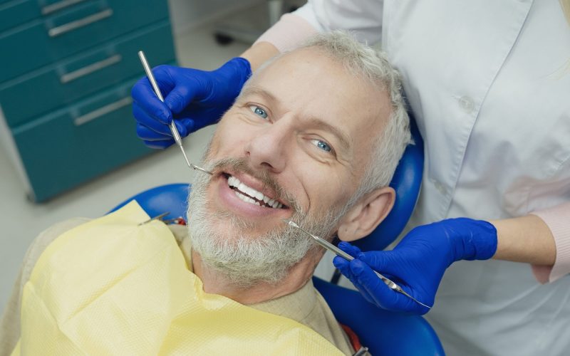 Smiling,Dentist,In,Dental,Hospital.,Dental,Doctor,In,Clinic,With